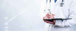 Doctor holding a clipboard